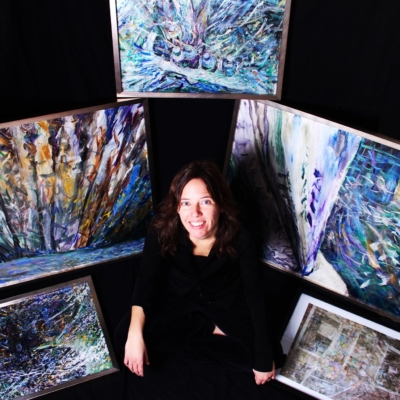 Kristy Simmons Poses with her Painting